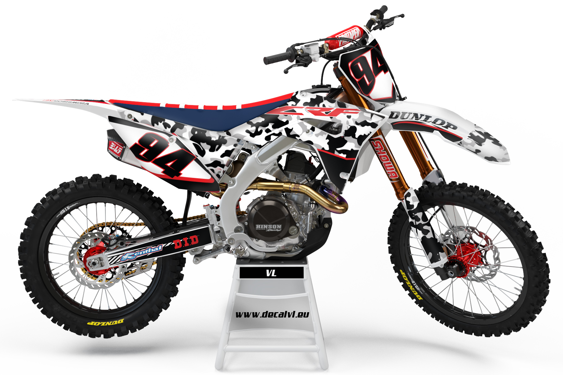 Honda CRF COW -tarrasarja asennettuna: mustavalkoinen cow-kuosi ja nuolimainen linjakkuus