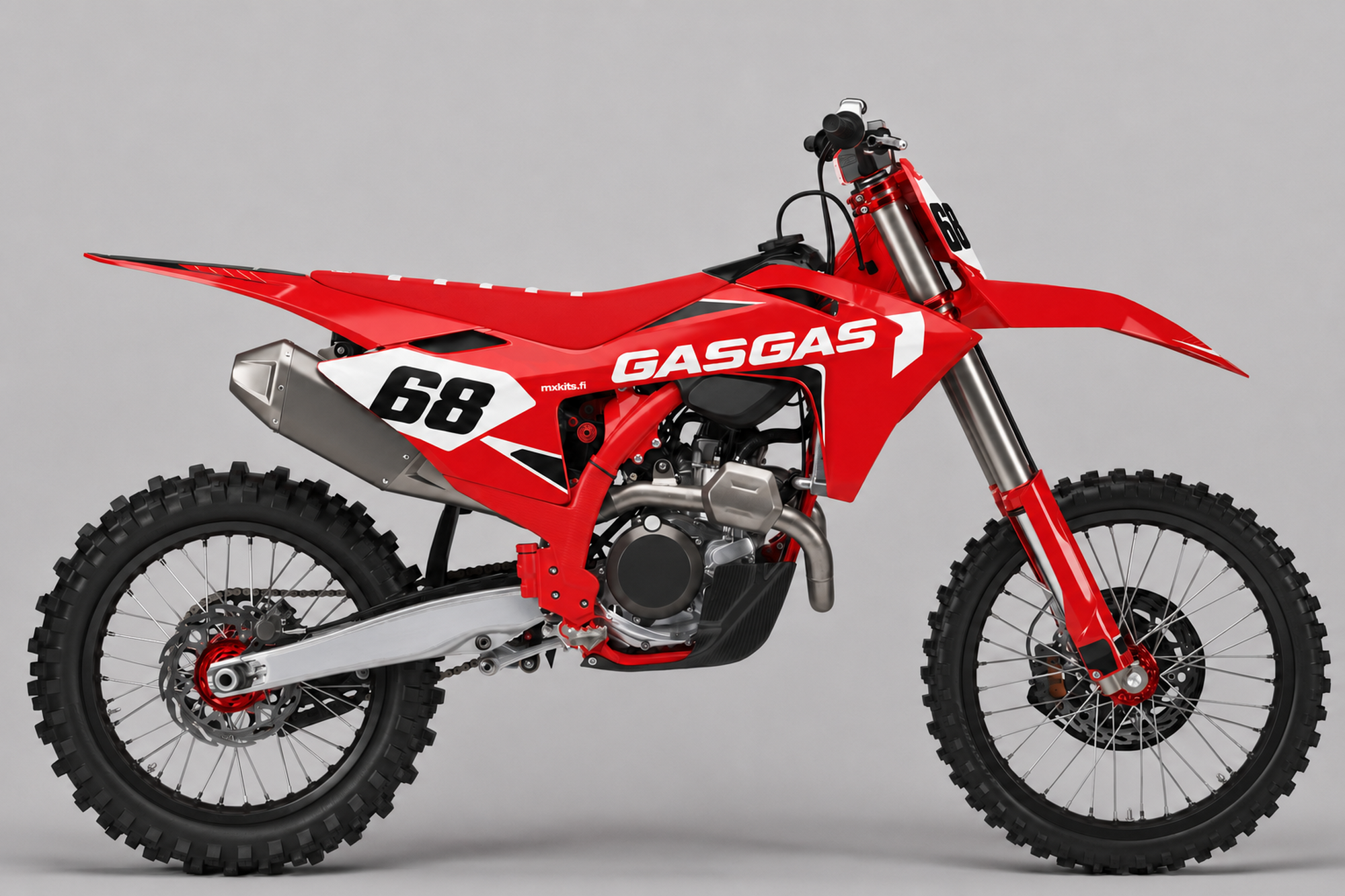 Punainen, valkoinen ja musta GasGas-motocrosspyörä kulmikkaalla grafiikalla, numero 68, GASGAS ja mxkits.fi.