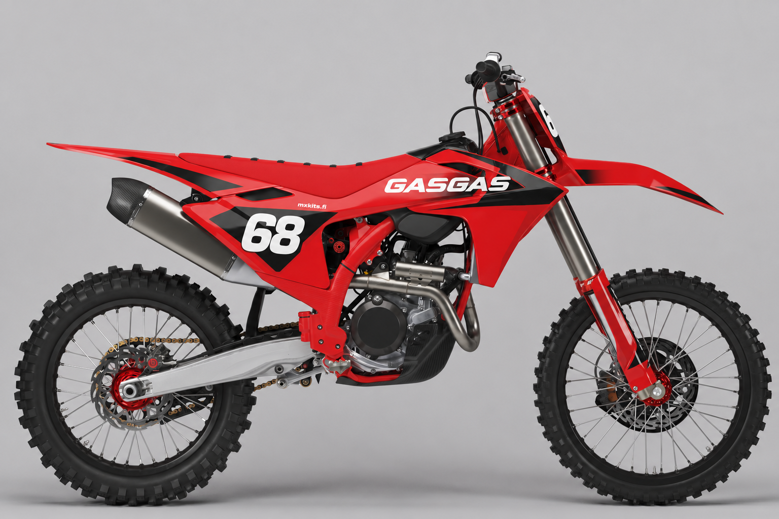 Punainen, musta ja valkoinen GasGas-motocrosspyörä sponsorittomalla Punahammas-grafiikalla, numero 68 ja mxkits.fi.