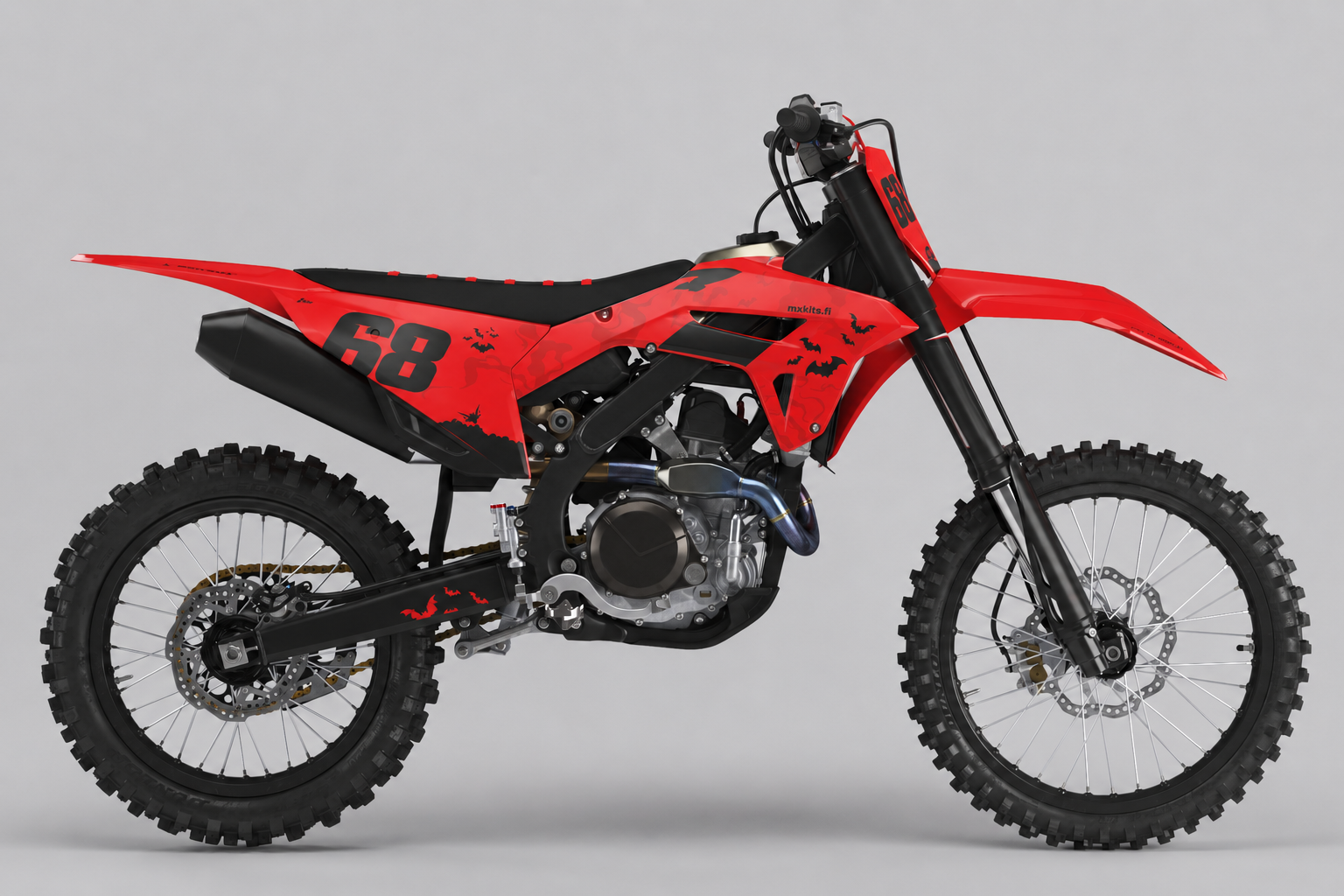 Honda CRF Lepakkoyö punamustalla lepakkokuviolla, numero 68 etu- ja sivukilvessä sekä mxkits.fi sivukatteessa.