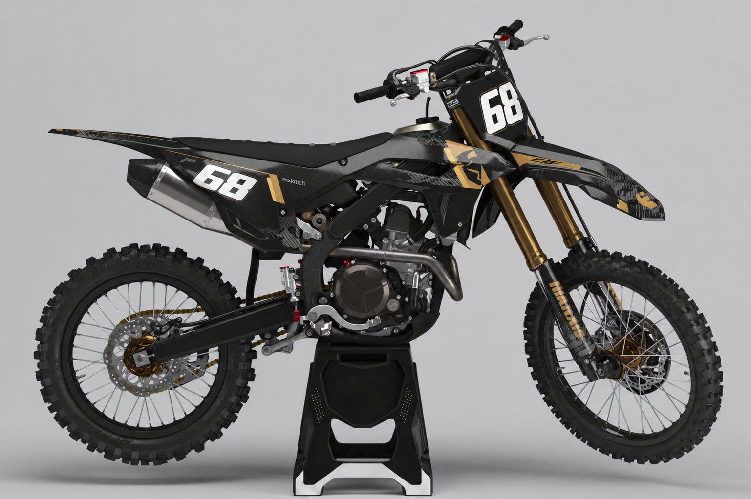 Musta-kultainen Honda motocross-pyörä, numero 68 kahdessa kilvessä ja pieni mxkits.fi sivupaneelissa.