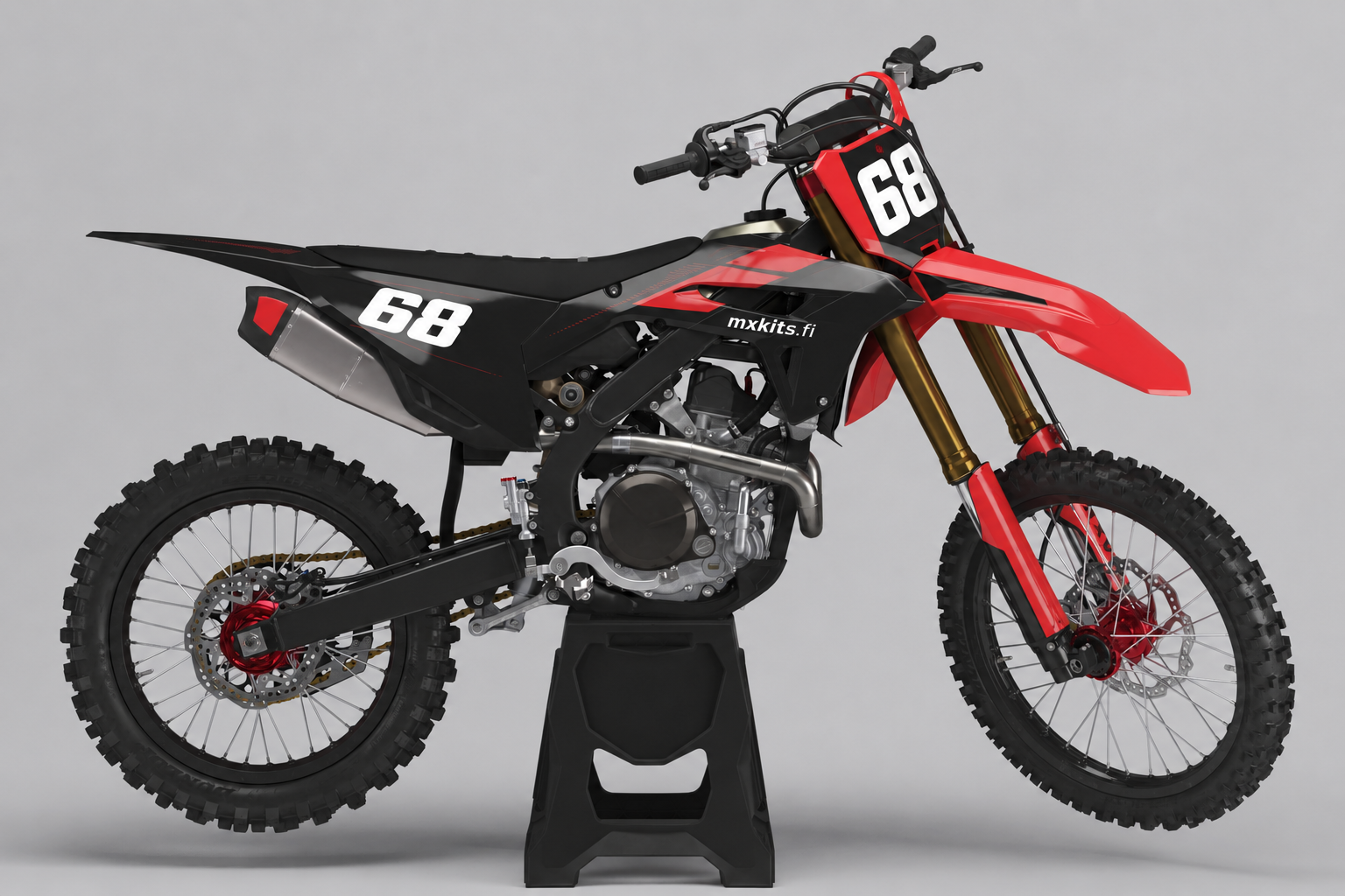 Punamusta Honda motocrosspyörä Punainen Vauhtiviiva -tarrasarjalla, numerolla 68 ja mxkits.fi-tekstillä