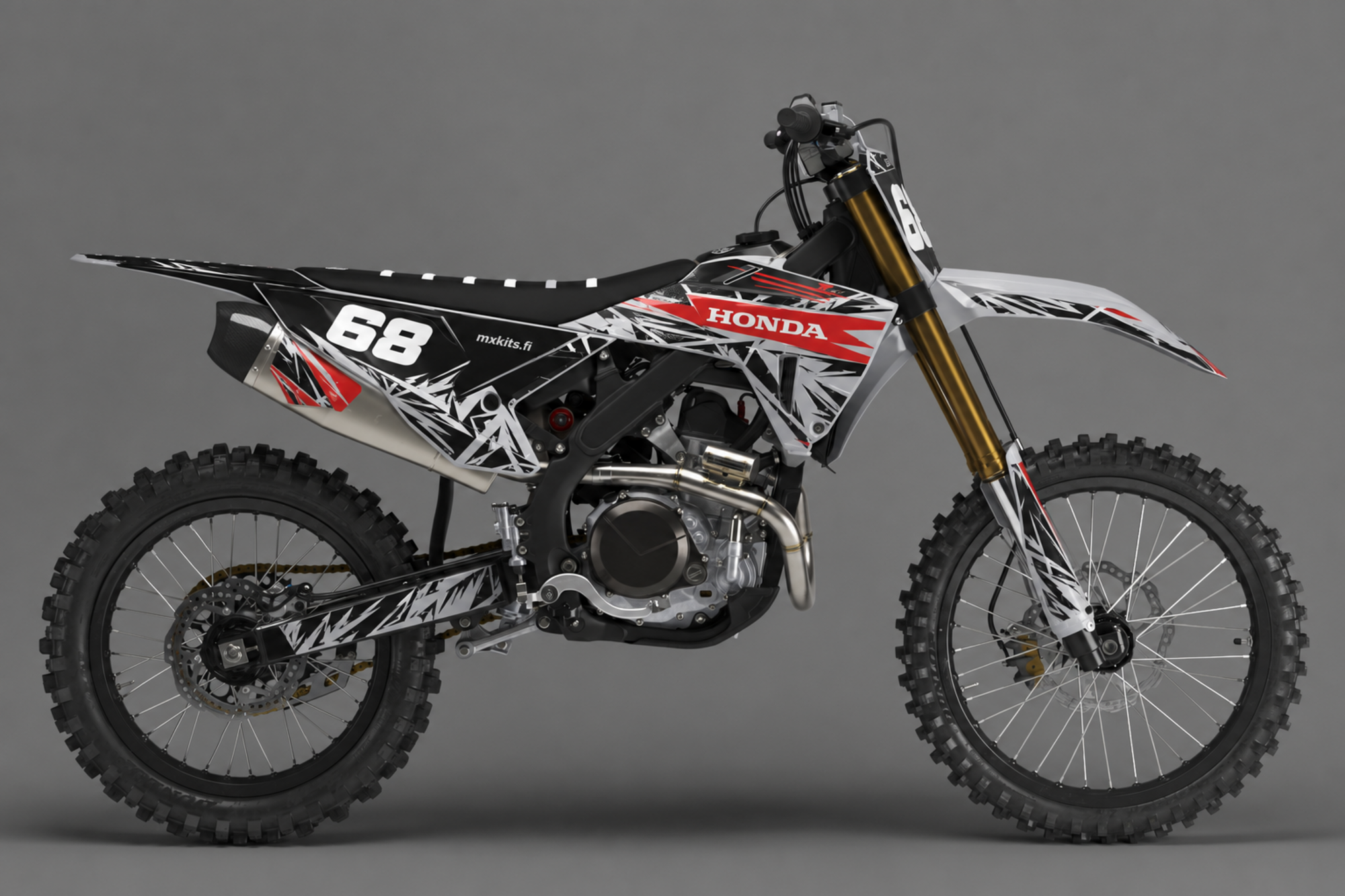 Musta, hopeanharmaa, valkoinen ja punainen Honda-motocrosspyörä Chaos Grey -grafiikalla, numero 68, HONDA ja mxkits.fi.