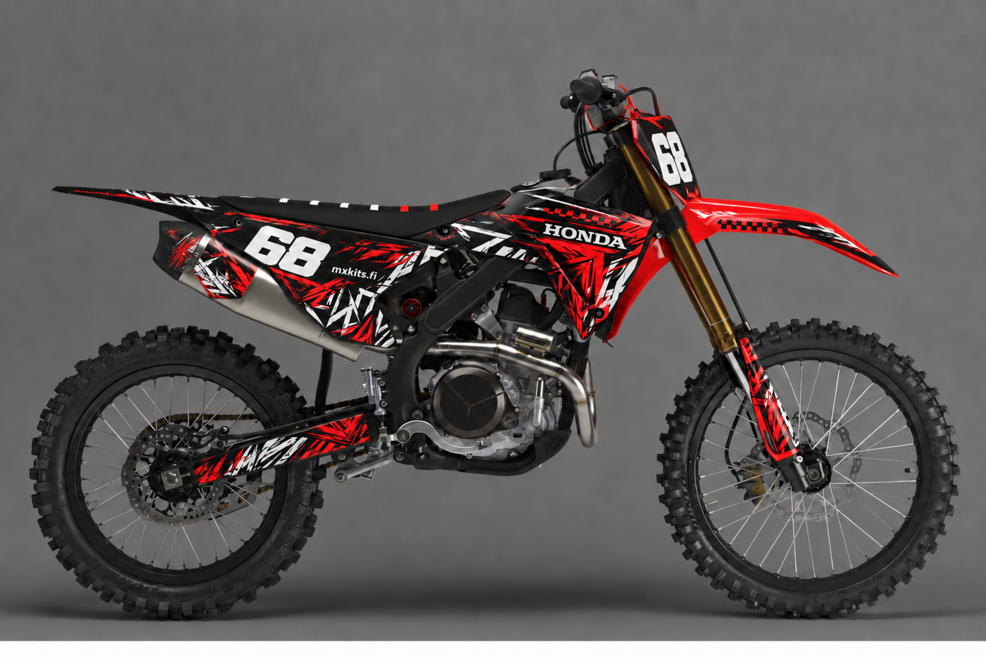 Musta, punainen ja valkoinen Honda-motocrosspyörä Chaos Murdered -grafiikalla, valkoinen numero 68, HONDA ja mxkits.fi.