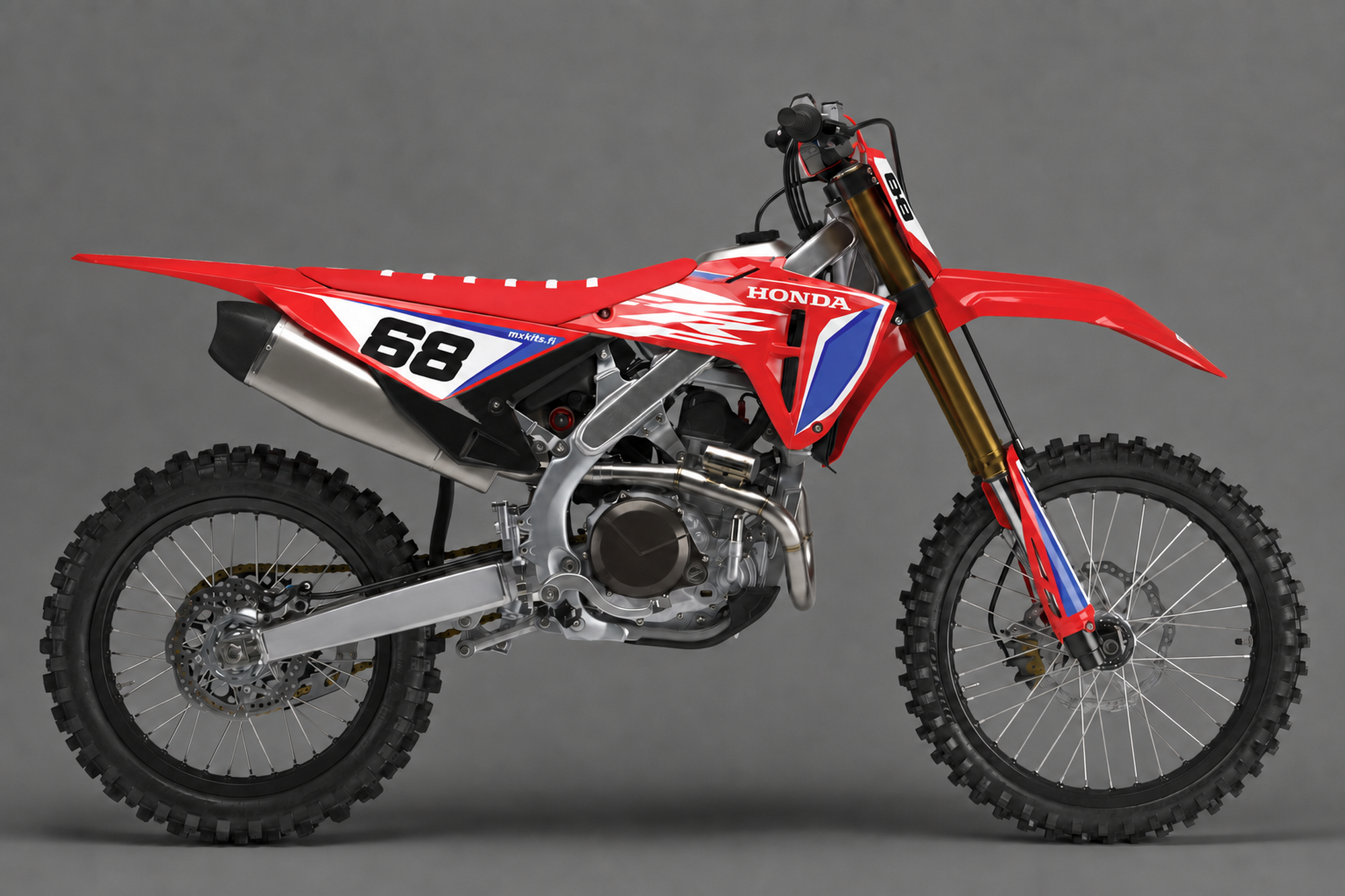 Punainen, valkoinen ja sininen Honda-motocrosspyörä Overcast Factory -grafiikalla, numero 68, HONDA ja mxkits.fi.