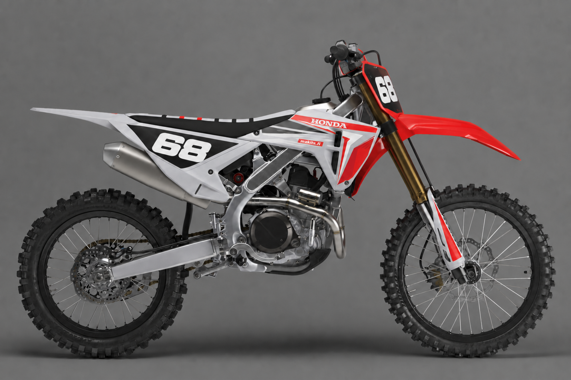 Punainen, valkoinen ja hopeanharmaa Honda-motocrosspyörä Overcast-grafiikalla, valkoinen numero 68, HONDA ja mxkits.fi.