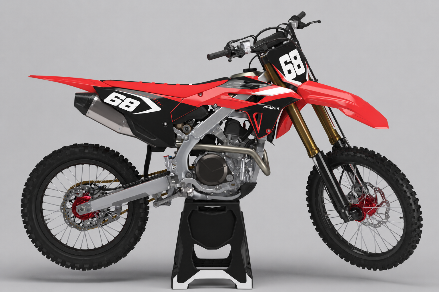 Honda Rajasyke -motocross-tarrasarja punaisella, mustalla ja valkoisella grafiikalla, numerot 68 sekä pieni mxkits.fi-sivumerkintä