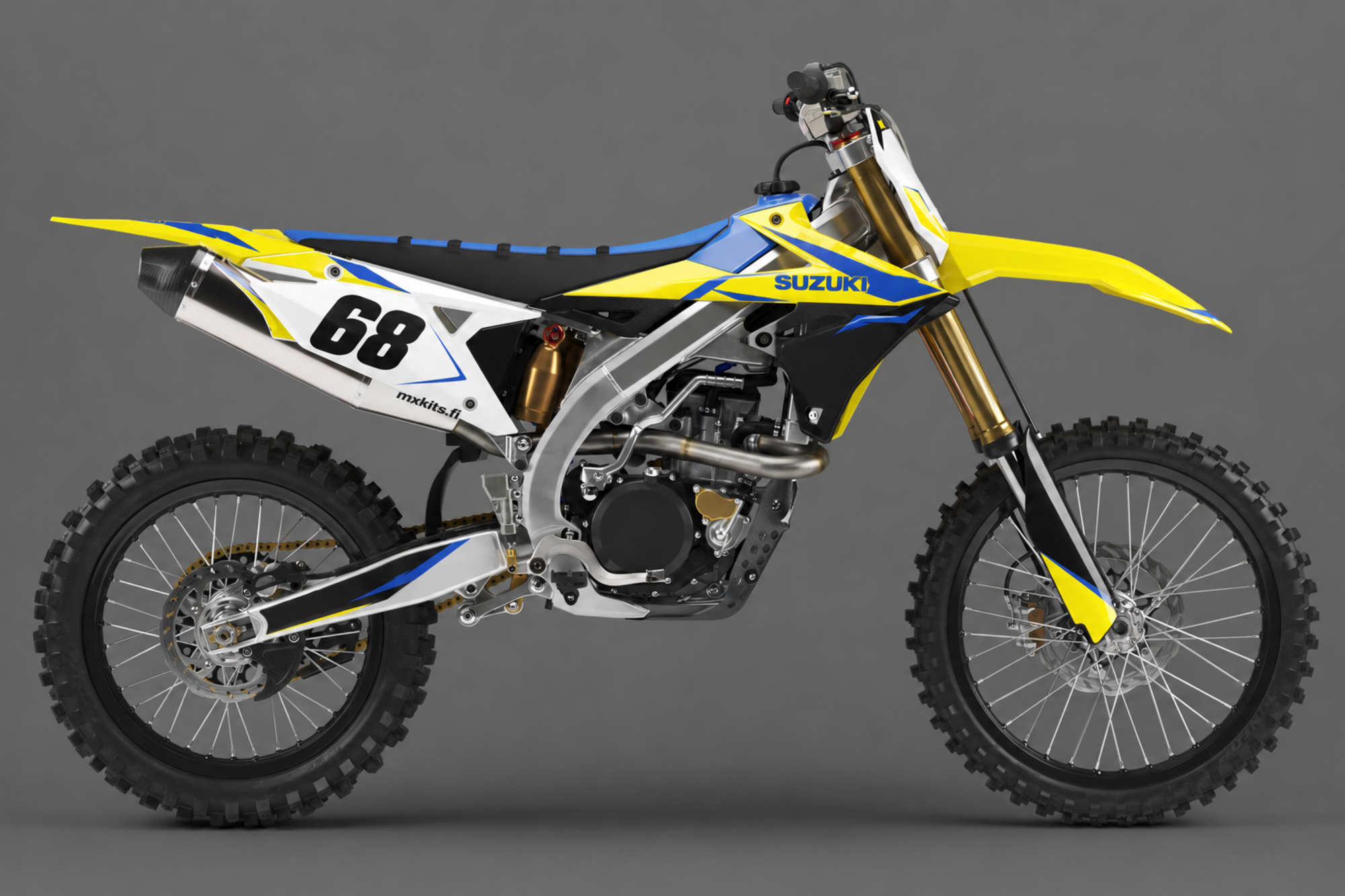 Keltainen, valkoinen, musta ja sininen Suzuki-motocrosspyörä Stock Blue -grafiikalla, numero 68, SUZUKI ja mxkits.fi.